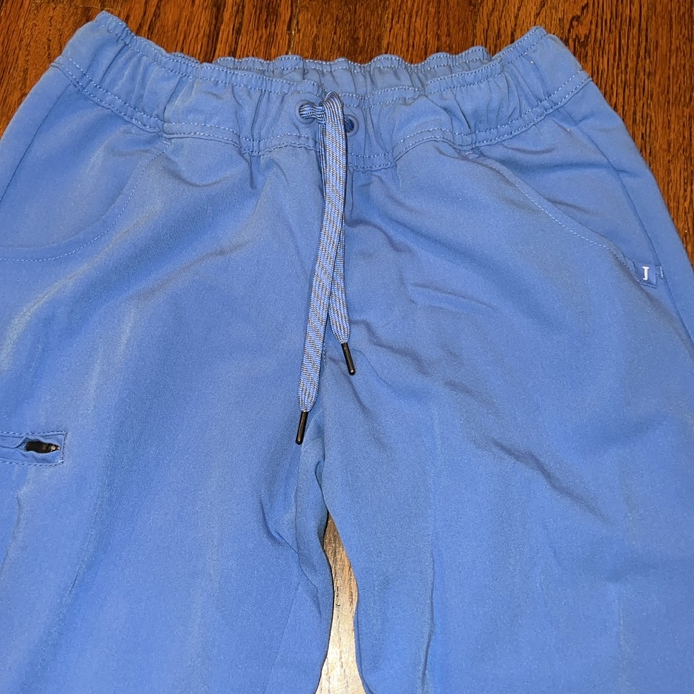 New without tags blue Jaanuu scrub bottoms - Picture 2 of 4